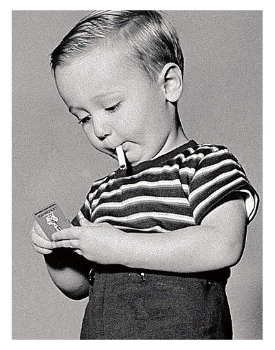 Little Boy Lighting up a cigarette